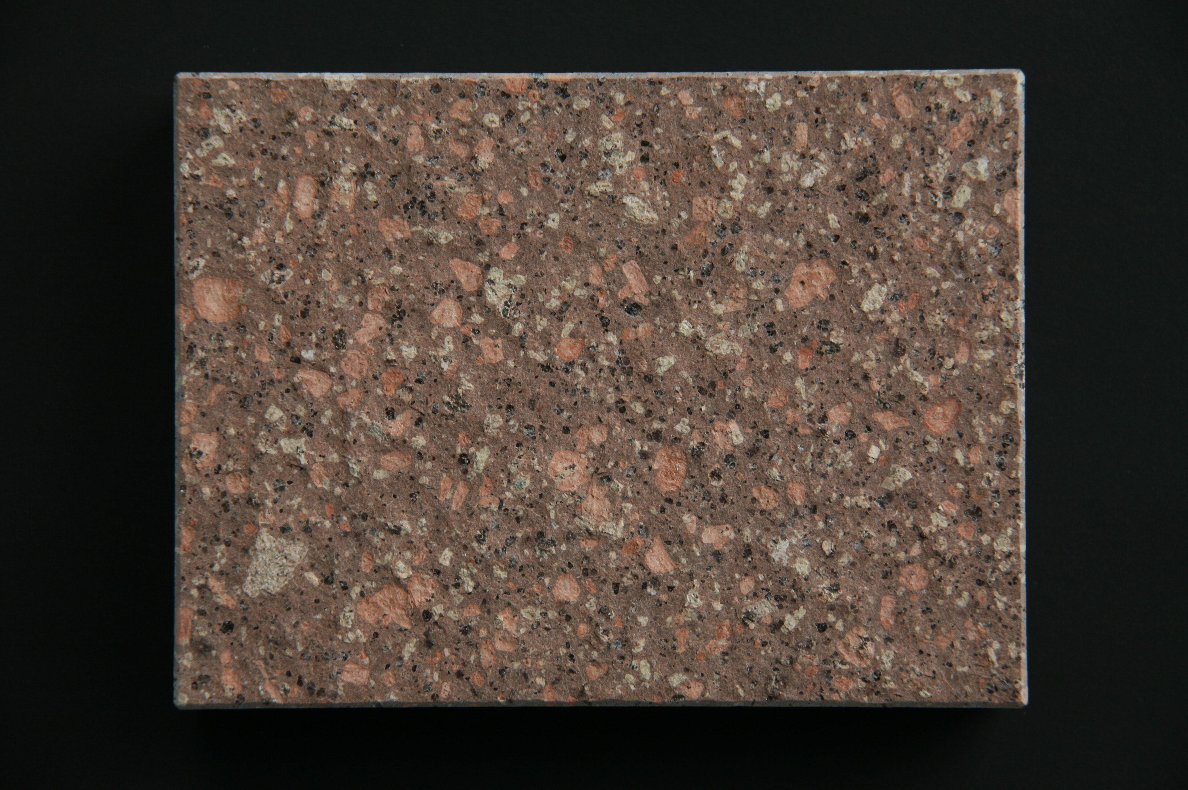 Flamed stone surface with a rough, crystalline texture